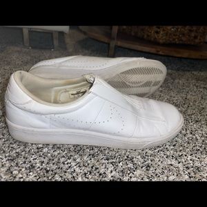Nike white slip on sneakers